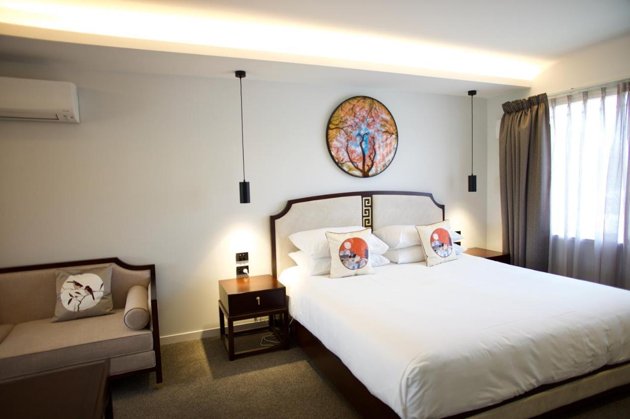 Regal Palms Resort Rotorua Bagian luar foto A bedroom at the hotel